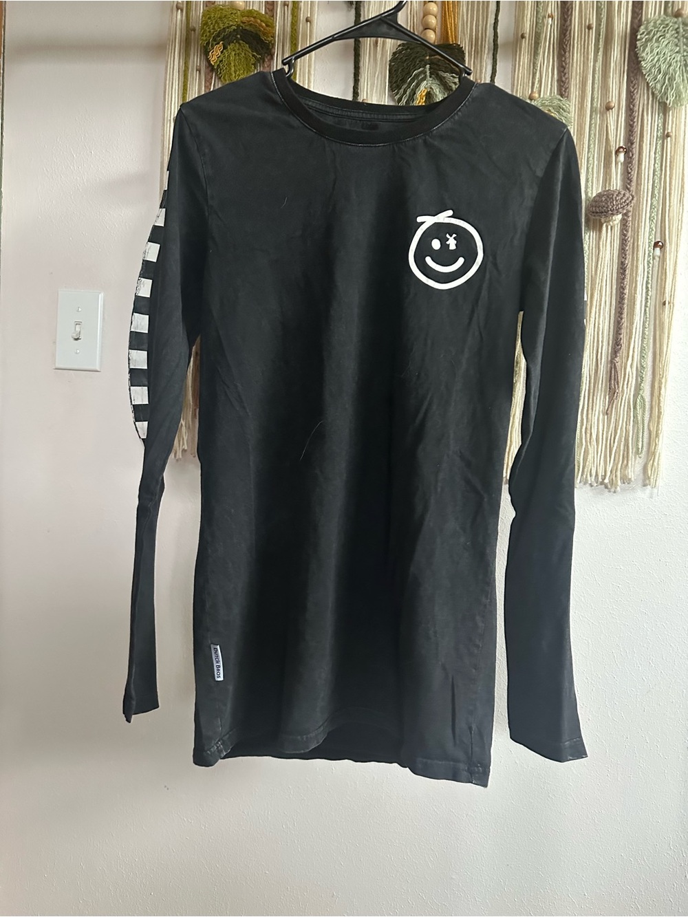 Dutch bros black checkered sleeve